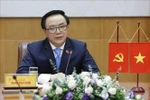 越中两党关系将继续维持积极发展态势