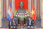 陈大光主席会见柬埔寨副首相兼内政部大臣韶肯（图片来源：越通社）