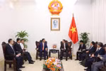 越南政府副总理陈红河会见中国铁建董事长戴和根。图自越通社