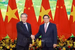 越南政府总理范明政与中国国务院总理李强在举行会谈前合影。图自越通社