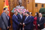 越南政府总理范明政会见美国航空租赁公司董事长
