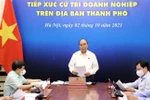 国家主席阮春福与胡志明市企业选民接触
