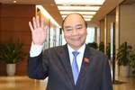越共十四届国会第十一次会议：国家主席提请国会免去政府总理职务