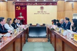 会见场景。图自越通社