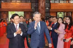 老挝人民革命党中央总书记、国家主席通伦·西苏里与越共中央总书记、国家主席苏林出席见面会。图自越通社