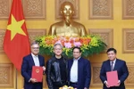 越南政府和NVIDIA签署关于在越南开设人工智能研发中心和人工智能数据中心的合作协议。图自越通社 