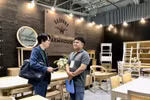 参加博览会的一个展位。图自越通社