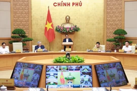范明政总理主持召开政府与各地方全国视频会议。图自越通社