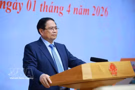 范明政总理发表讲话。图自越通社