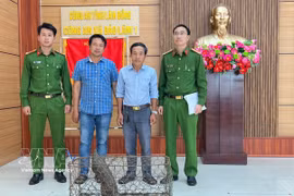 林同省民众主动上交红皮书濒危保护动物——穿山甲。图自越通社