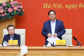 政府总理范明政发表讲话。图自越通社