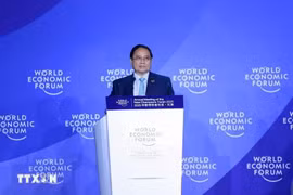 范明政总理发表讲话。图自越通社