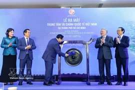 范明政总理鸣锣宣布胡志明市越南国际金融中心正式投运。图自越通社