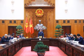 越南政府总理、宏观经济调控指导委员会主任范明政主持召开委员会第二次会议。图自越通社