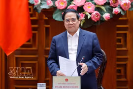 范明政总理发表讲话。图自越通社