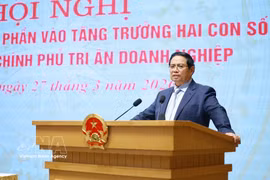 越南政府总理范明政发表讲话。图自越通社