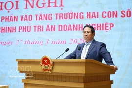 越南政府总理范明政发表讲话。图自越通社