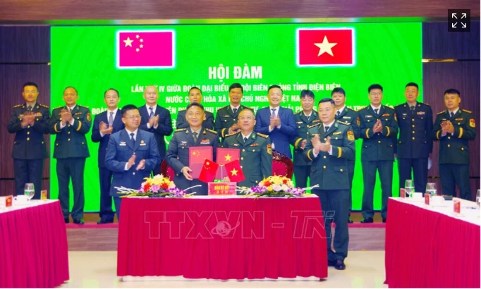 双方合作备忘录签署仪式。图自越通社