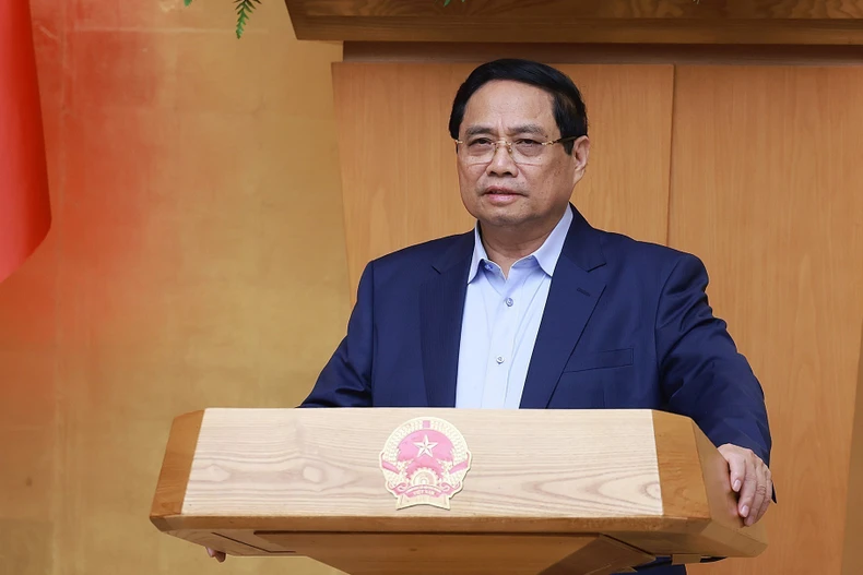 范明政总理主持政府关于越南国际金融中心专题会议。图自越通社