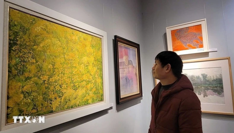 此展参观者。图自越通社