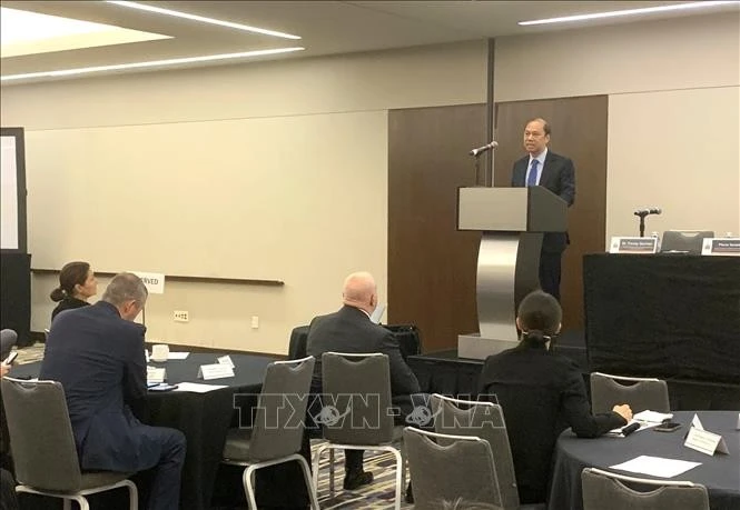 越南驻美国大使阮国勇在研讨会上发表讲话。图自越通社