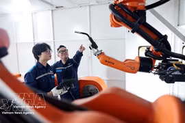 越共中央政治局第57号决议已明确指出，科学、技术、创新与数字转型是战略突破，在国家新型增长模式中发挥着关键作用。图自越通社