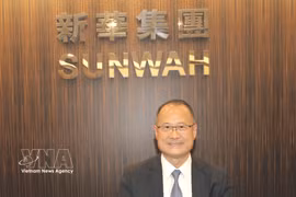 香港新华集团主席、香港中华总商会会长、越南VinaCapital集团主席蔡冠深博士 图自越通社