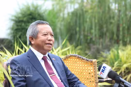 老挝—越南友好协会主席博温坎·冯达拉教授接受越通社记者采访 图自越通社
