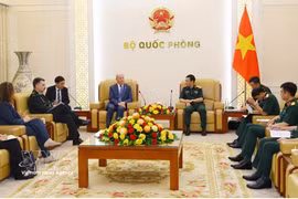 会见场景 图自越通社