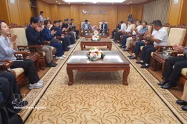 越南记者协会在河内与韩国记者协会代表团举行工作会谈 图自越通社