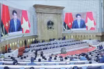 越南国家主席梁强出席安哥拉国民议会特别全体会议并发表讲话。图自越通社