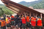 截至目前，全国63个省市中已有21个不复存在临时住房和危旧房。图自越通社