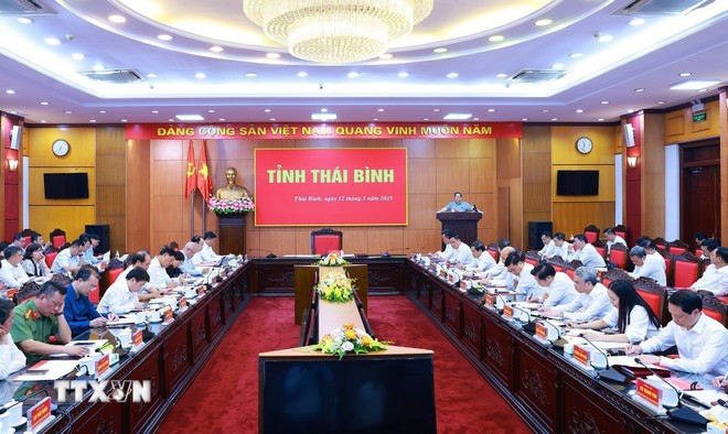 会议场景。图自越通社 thu-tuong-pham-minh-chinh-lam-viec-thai-binh-1.jpg