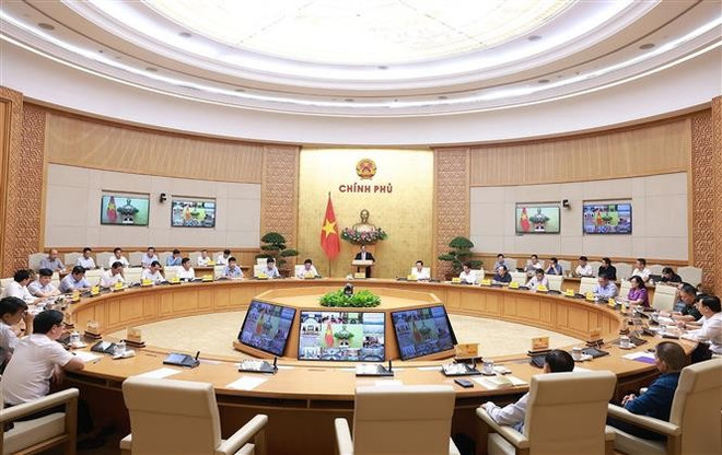 会议现场。图自越通社 vna-potal-thu-tuong-phien-hop-lan-thu-20-cua-bcd-cac-du-an-trong-diem-nganh-giao-thong-van-tai-8267912.jpg