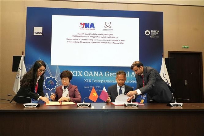 越通社与卡塔尔国家通讯社签署合作与交流谅解备忘录。图自越通社 vna-potal-dau-an-tai-dai-hoi-dong-to-chuc-cac-hang-thong-tan-chau-a-lan-thu-19-8102311.jpg