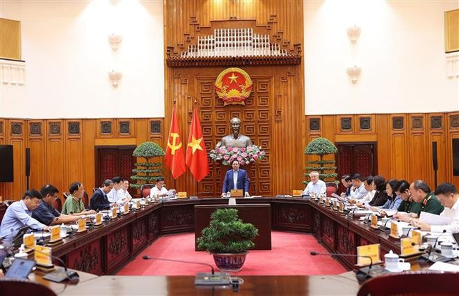 会议全景。图自越通社 vna-potal-thu-tuong-hop-trien-khai-khac-phuc-hau-qua-thien-tai-8327058-2.jpg