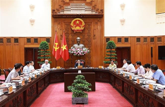 会议现场。图自越通社 vna-potal-thu-tuong-chu-tri-hop-ban-thuong-vu-dang-uy-chinh-phu-ve-du-thao-de-an-phat-trien-van-hoa-8124702.jpg