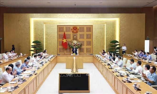 越南政府总理范明政与政策咨询委员会举行工作会议。图自越通社 hinh-anh-4.jpg