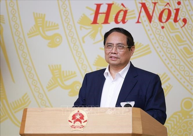 政府总理范明政在会上发表总结性讲话。图自越通社 kl1.jpg