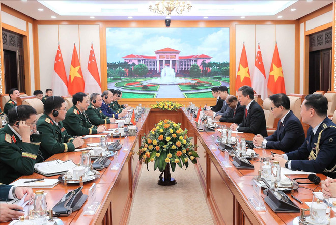 会谈场景。图自越通社 vna-potal-bo-truong-quoc-phong-singapore-tham-chinh-thuc-viet-nam-816332222-10-20-45.jpg