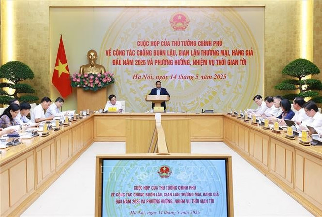 会议场景。图自越通社 vna-potal-thu-tuong-chu-tri-hop-ve-cong-tac-chong-buon-lau-gian-lan-thuong-mai-hang-gia-stand-1.jpg