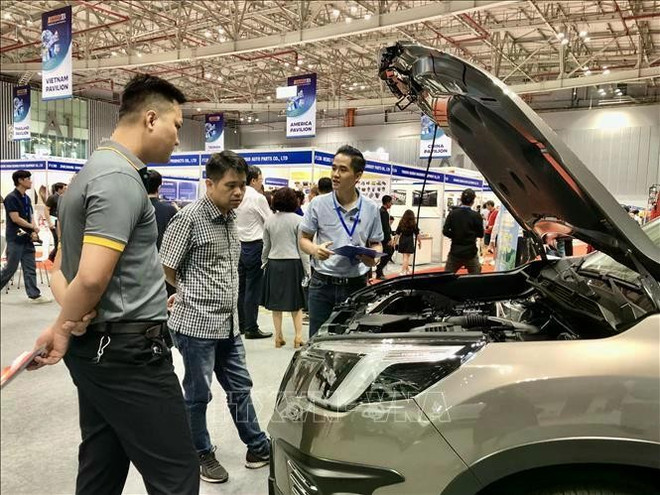 此展也是企业和客户接触汽车、摩托车和电动汽车行业各种产品和服务的机会。图自越通社 expo-5489.jpg