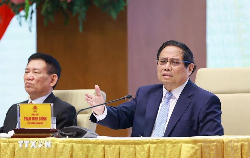 越南政府总理范明政在政府总理与数字化转型和推动增长领军国有企业会议发表讲话。图自越通社