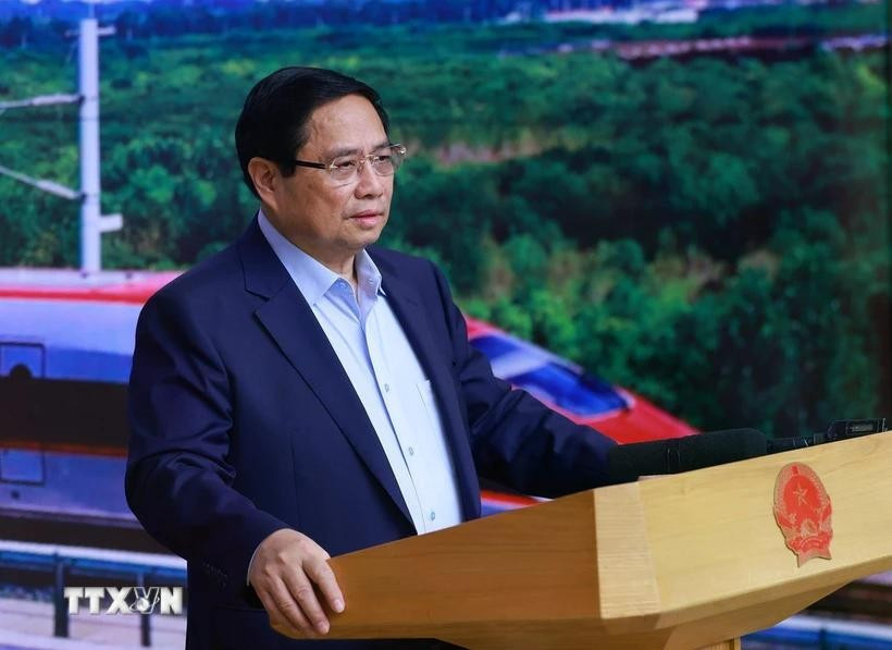 越南政府总理、指导委员会主任范明政在会议上发言。图自越通社