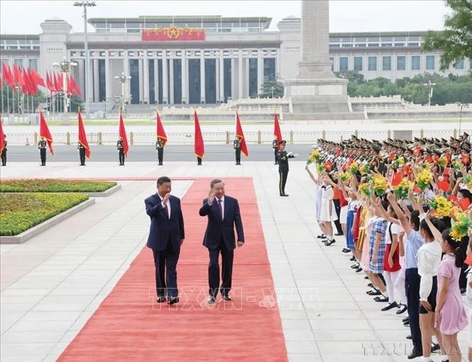 中共中央总书记、国家主席习近平夫妇主持仪式，欢迎苏林总书记夫妇于2024年8月18日至20日对中国进行国事访问。图自越通社