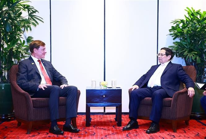 政府总理范明政会见巴航工业总裁内托。图自越通社