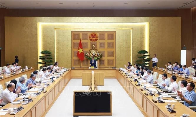 会议场景。图自越通社