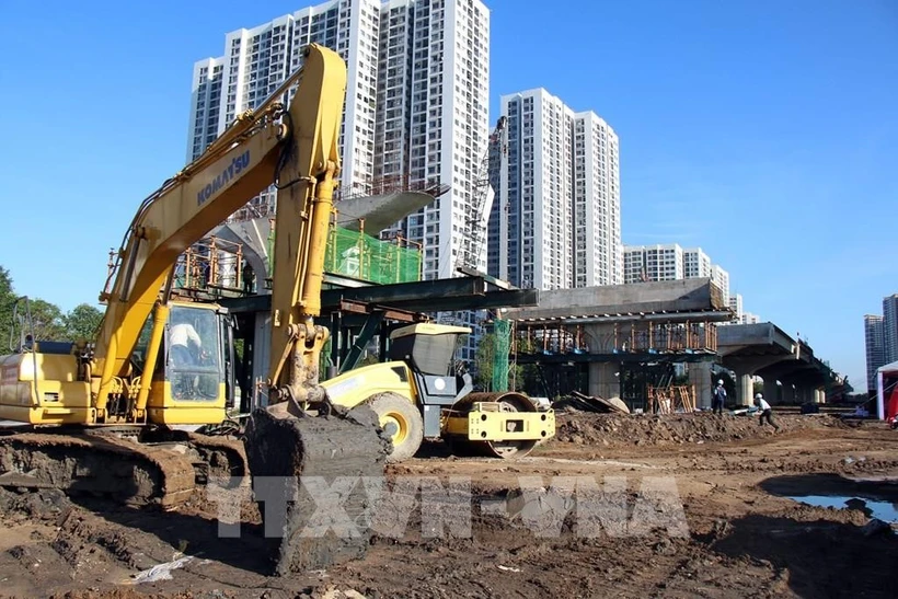 胡志明市3环路建设项目施工现场。图自越通社