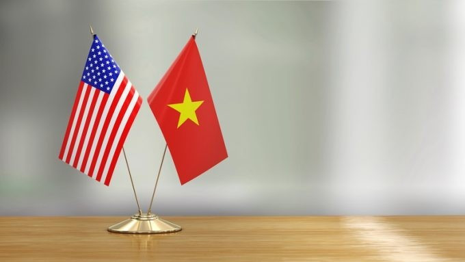 越美两国国旗。图自越通社
