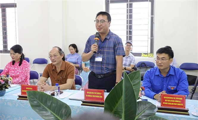 奠边省民族寄宿中学校长武忠环在会上发表讲话。图自越通社